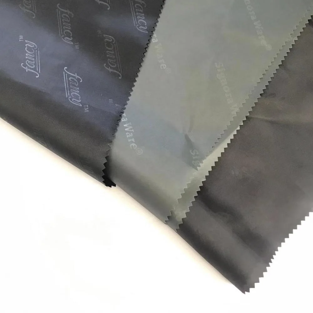 Source fabric taffeta lining custom logo emboss lining fabric 100