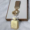 Perfume bottle (containing 20mg of gold - brown cord)