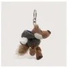 The little wolf doll wearing slate gray hooded coat