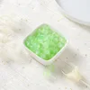 Perles de verre bicolores - vert et blanc