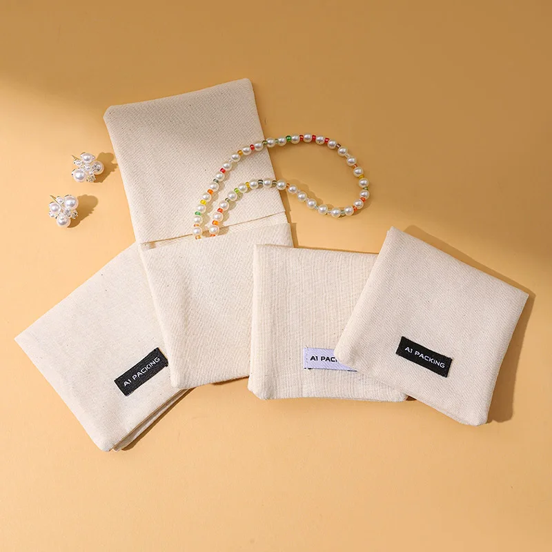 Wholesale A1 Brand Premium Cotton Flap Bag Jewelry Storage Pouches with Custom Logo for Gifting & Packaging supplier
