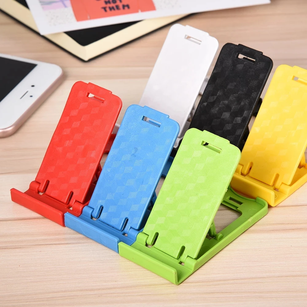 Foldable universal adjustable mobile phone holder