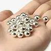 One pound of silver straight-hole pearls