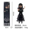 Robe de soirée noire, modèle 2ème génération-11, ornée de deux tresses.