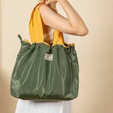 Wholesale custom  luxury foldable bulk reusable non woven shopping bag with logos