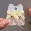 Ab glue yellow fishtail ear clips