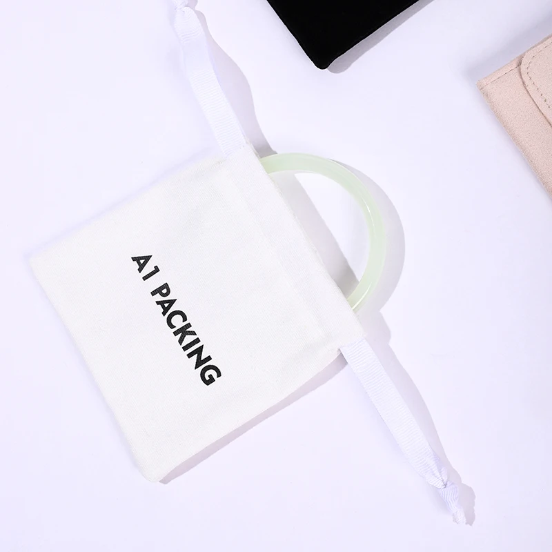 A1 Luxury Paper Jewelry Gift Bags Drawstring Pouch Storage Package Rings Necklaces Bracelets CMYK/Pantone Color Embossed Logo supplier