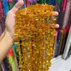 11 Side Drilled Teeth Amber 9-18mm