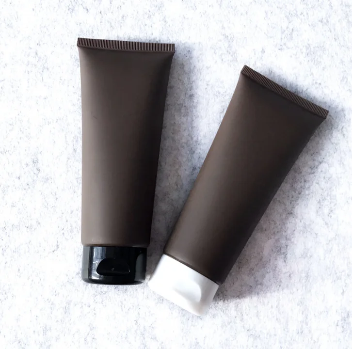 50ml 100ml 150ml PE Plastic Matt Shiny Brown Matt Brown White Cream Soft Tube Cleanser Tube Hand Lotion Tube with Black Flip Lid