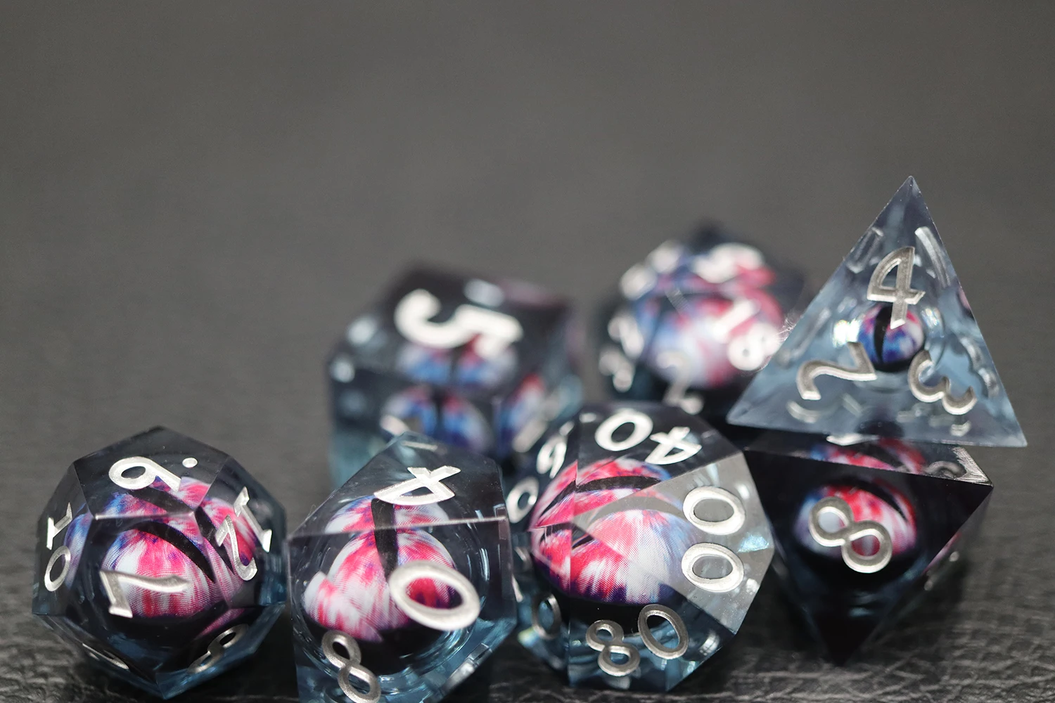 Custom DND RPG Dice Set 7pcs Blood Dragon Eye Liquid Core Resin Board Game Dice supplier