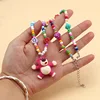 Collier de perles de rocaille ours fraise