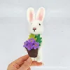 White rabbit holding a basket