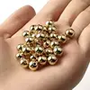 One pound of imitation gold straight-hole pearls