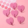 Heart-shaped hooks in rose red