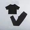Maglia nera a maniche corte+leggings
