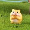4 Hamster mordant une pièce d'or