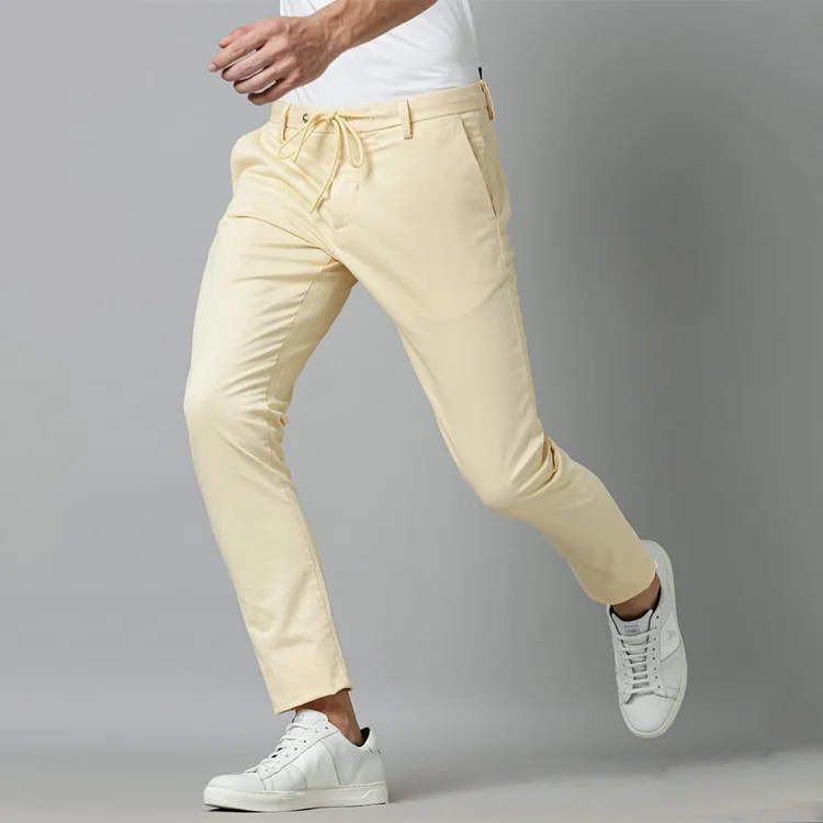Buy Men Yellow Mid Rise Regular Fit Pants Online In India