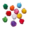 Pompones de hilo dorado de 1,5 cm.