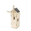 Casa con molino de viento solar W110