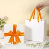 Lazo de etiqueta naranja; 20,5*20,5*10 (bolsa de regalo en caja de regalo)