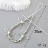 K3281 3-strand bow phone charm