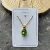 Golden thread-green sea glass