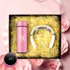 สีชมพู-ขวดน้ำ + เครื่องนวด