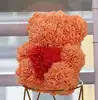 fat orange bear with red heart with box
