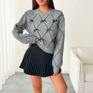 A casual grey women's knitted sweater with bow decoration, round neck and pullover in winter 2025