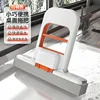 Mini trapeador plegable de mano con una almohadilla de algodón