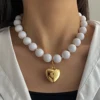 White & Gold Heart E