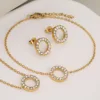 Gold and white rhinestone set