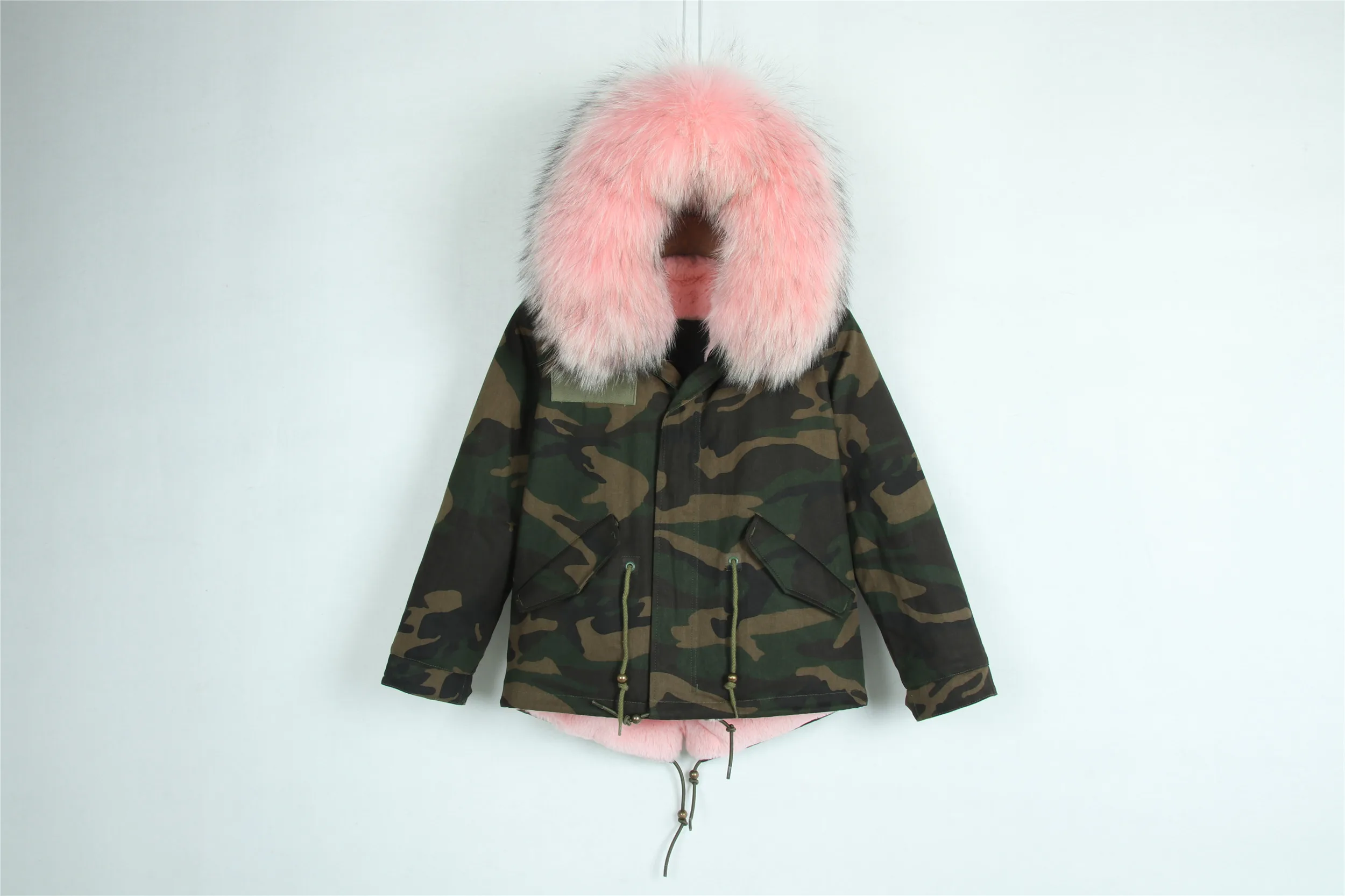 camouflage coat with pink lining