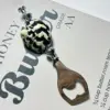 Black Iron Snail Bottle Opener