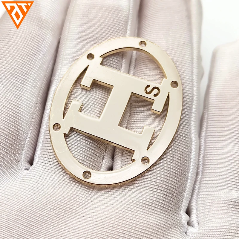 Etiquetas de imitación de metal dorado con logotipo de marca