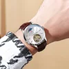 6045 silver shell belt white face