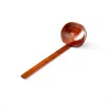 Brown soup spoon