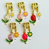 Gold/enamel tulip+daisy