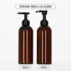 Light brown bottle with black lotion pump