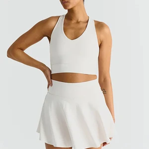 Custom High Quality 2 Piece Outfits Gym V-neck Cross Back Sports Bra  Women  Skirt Sets With Pocket