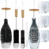 Ensemble trois pièces noir avec poignée + 1 brosse à paille + 3 crochets