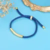 Ciondolo in oro + cordoncino blu