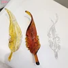 Single glass feather 20cm