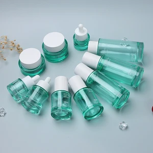 Hot Selling New Design Wide Mouth Cosmetic Jar 1OZ 15ml 40ml 120ml Translucent Green Glass Bottles Set for Skin Care