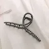 7 twist cross-gun black