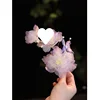 A peony hair clip (blue-purple).