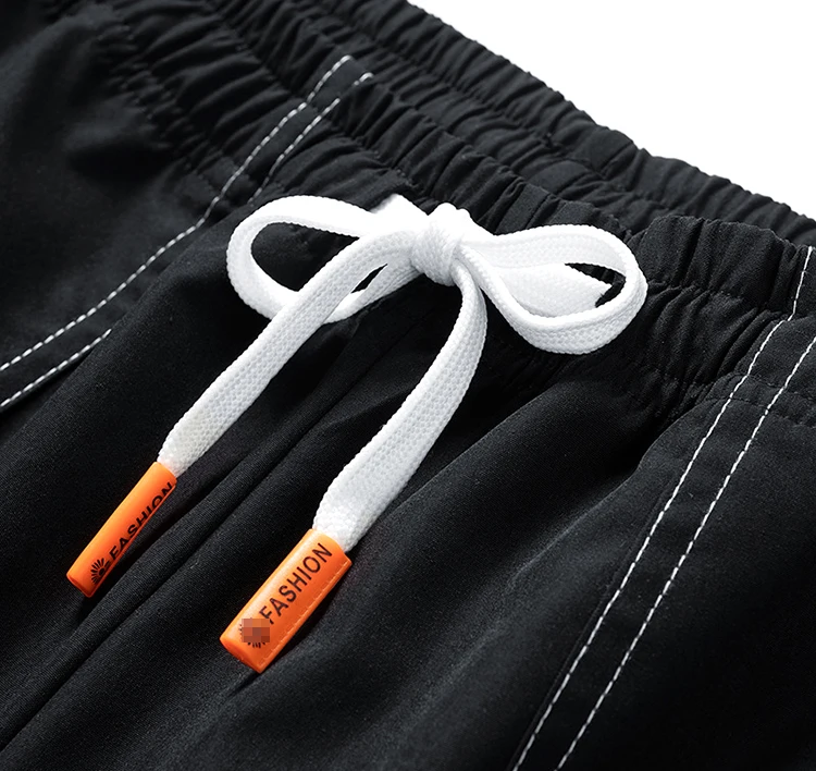 gyártó nagykereskedelmi kiváló minőségű lezser poliészter spandex plus size nyári rövidnadrág férfi utcai viselet férfi rövidnadrág290_voghion.com