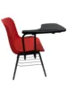 Chaise d'école rouge, tablette, livre, panier.