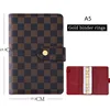 Raccoglitore A5 marrone + rosso + oro