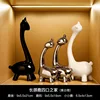 Ensemble de quatre ornements de girafe